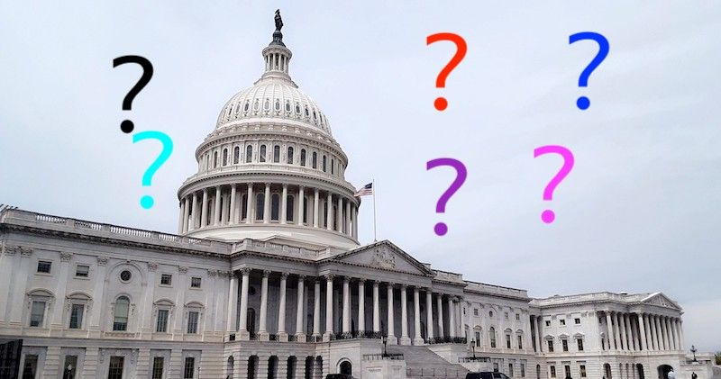 The US Capitol, with a grey sky i the background, and six big question marks in different colors