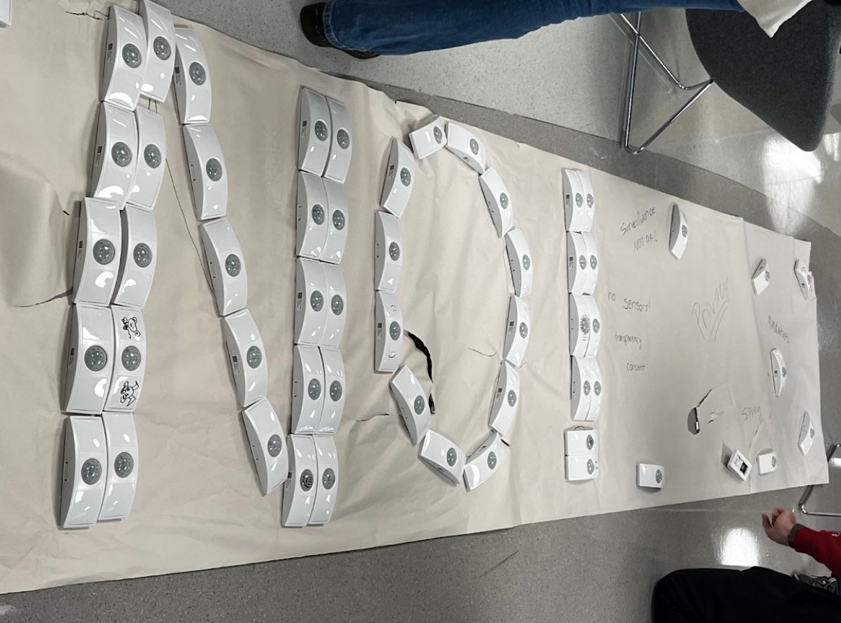 A wall hanging with white sensors, each about eight inches long, arranged to spell the word NO!